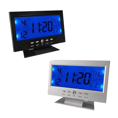 Hangra/tapsra működő LCD kijelzős asztali óra